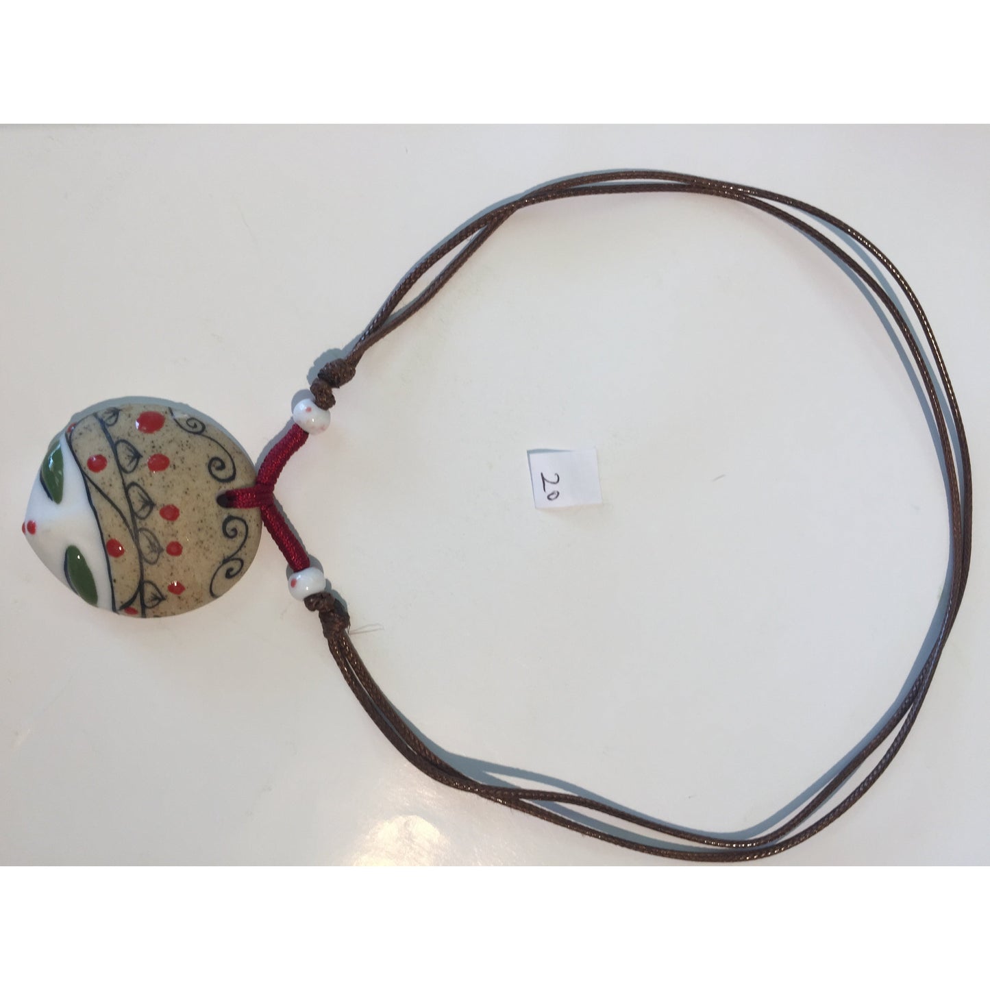 20 Track Face Porcelain/Facebook Necklace