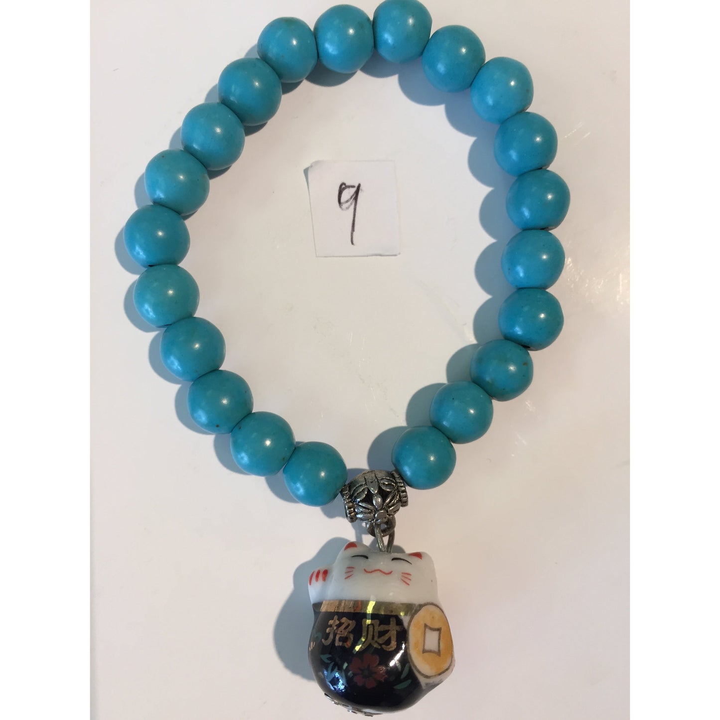 9A (19 beads + 2 cats) rubber band bracelet,