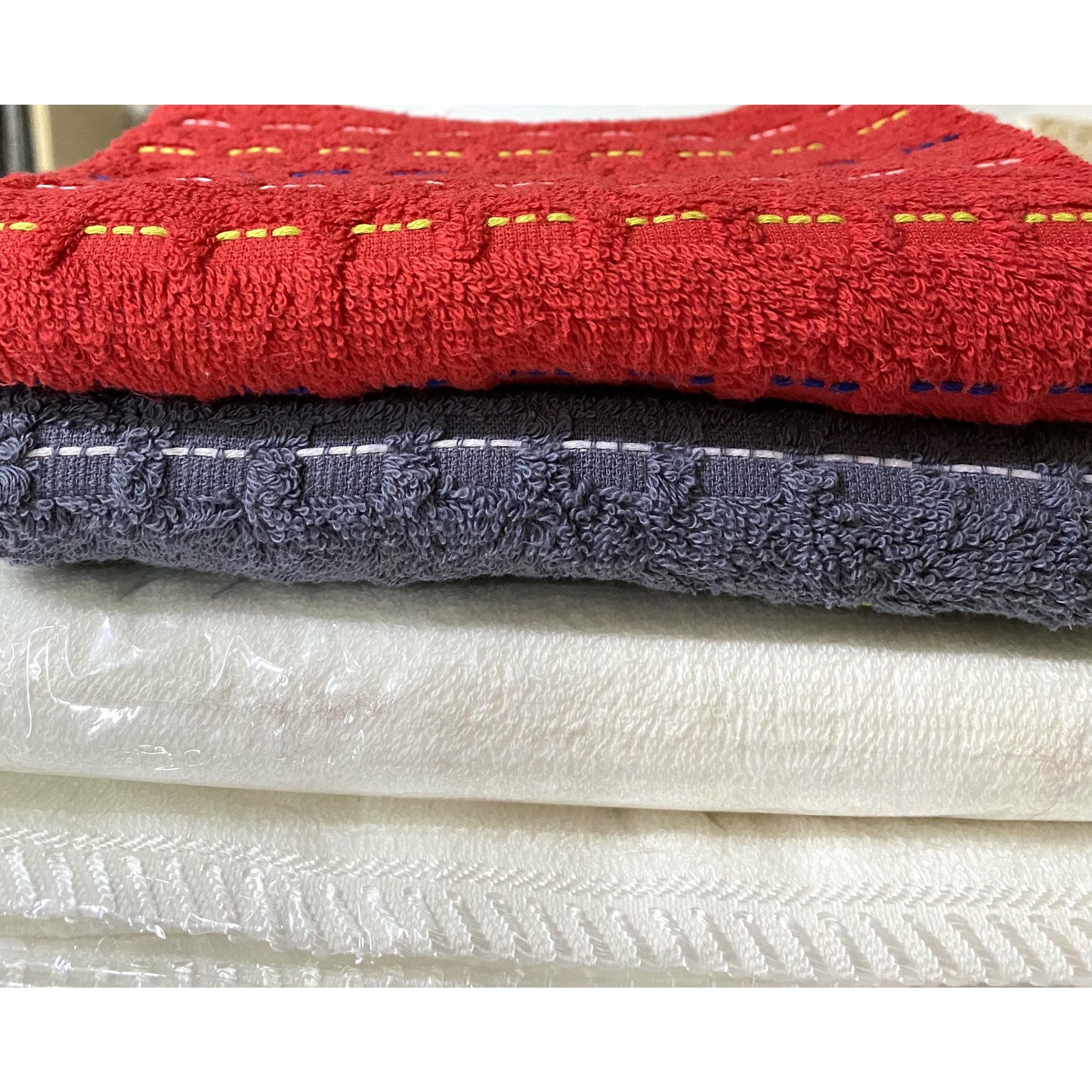 1-Two bath towels (plain color) + two towels