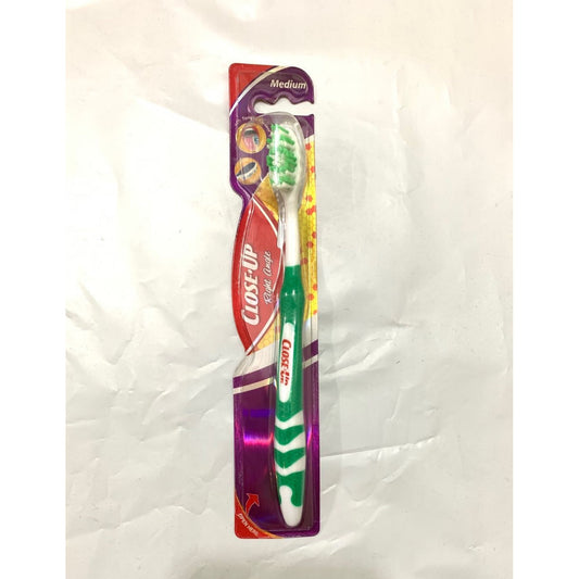 1- One adult toothbrush Medium